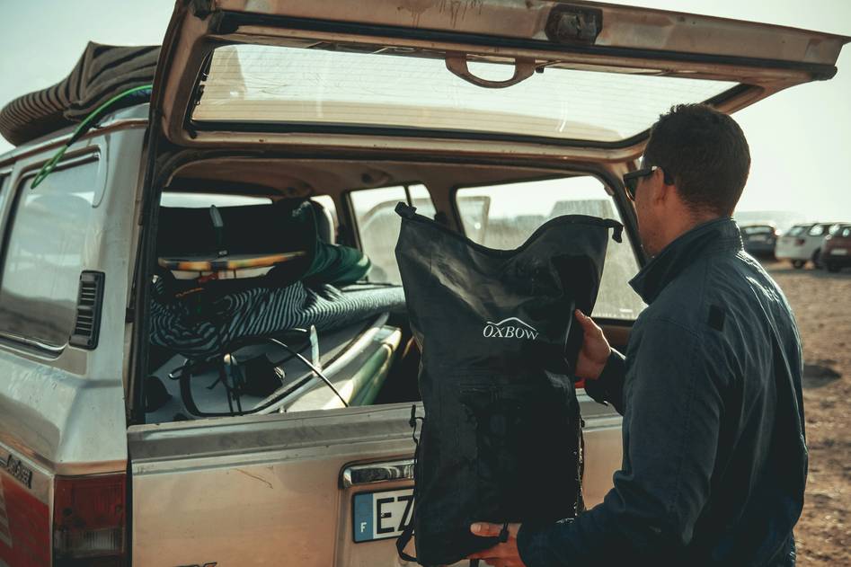 Close-up of durable surfboard travel bag with wheels and protective padding