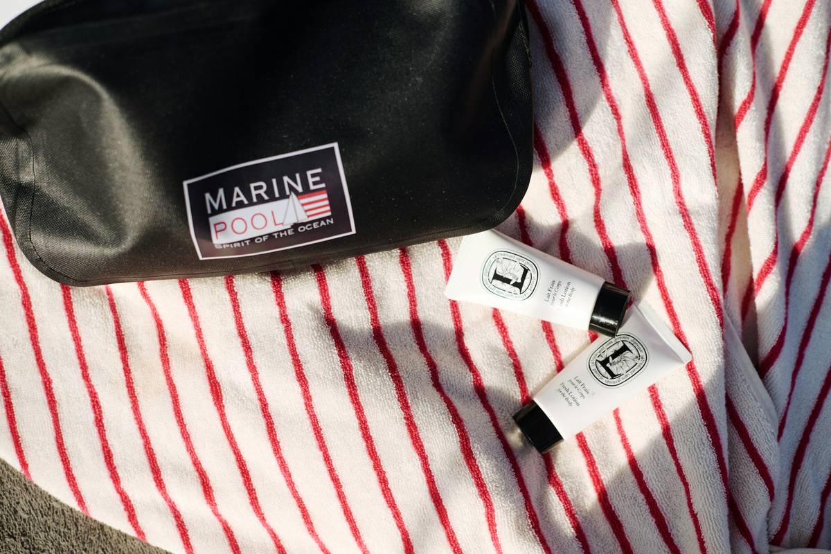 Premium board vault bags with hard-shell exterior and internal padding protecting a surfboard during air travel